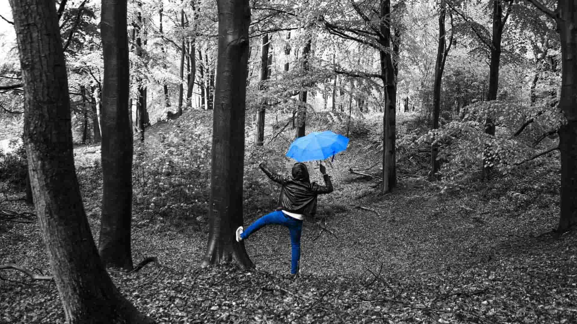 Children singing and dancing in the rain